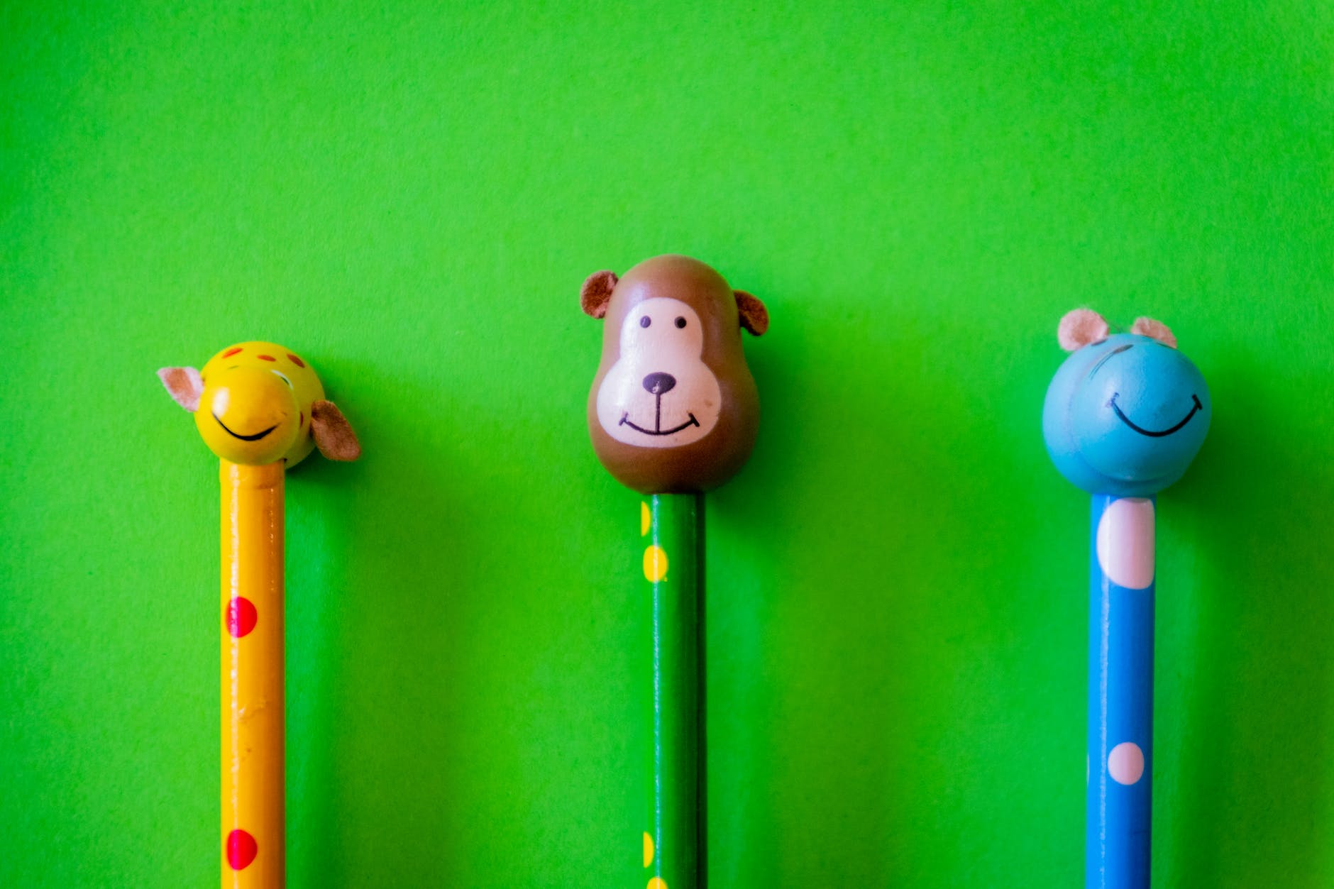 three animal head pencils